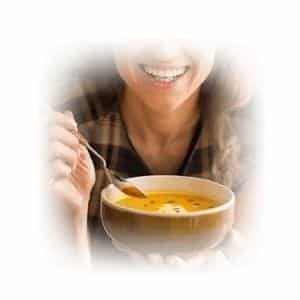 Lady Enjoying a bowl of soup from the keto shortcut system