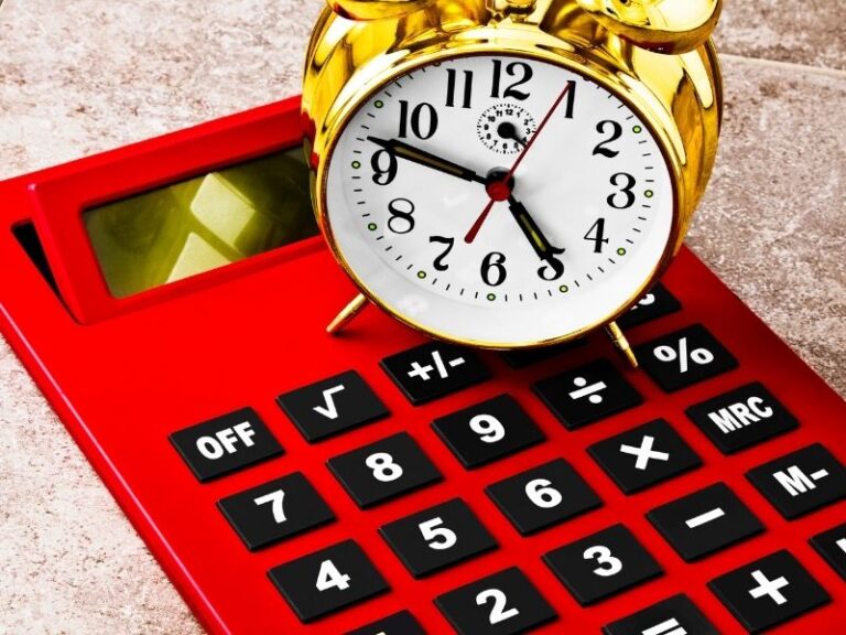a clock on top of a calculator to depict time conversion