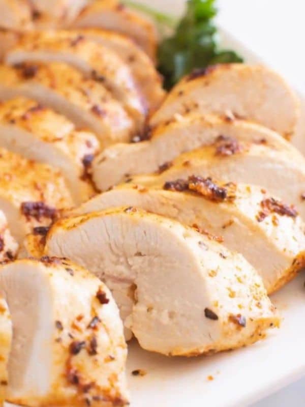 Learn how to make the juiciest Air Fryer Chicken Breast in 25 minutes. It is easy, tender and bursting with flavor!