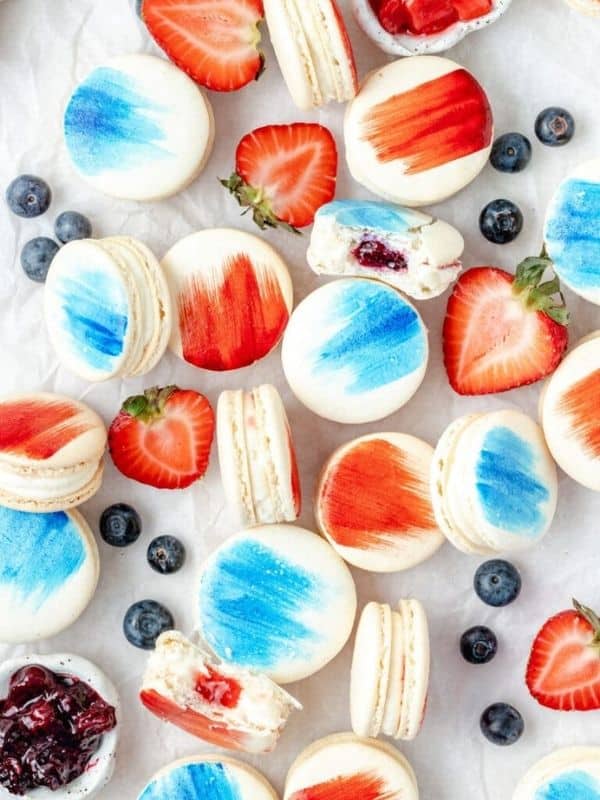 red, white, & blue berry macarons