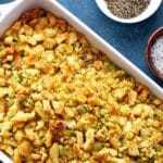christmas side dish on stuffing in a white casserole dish