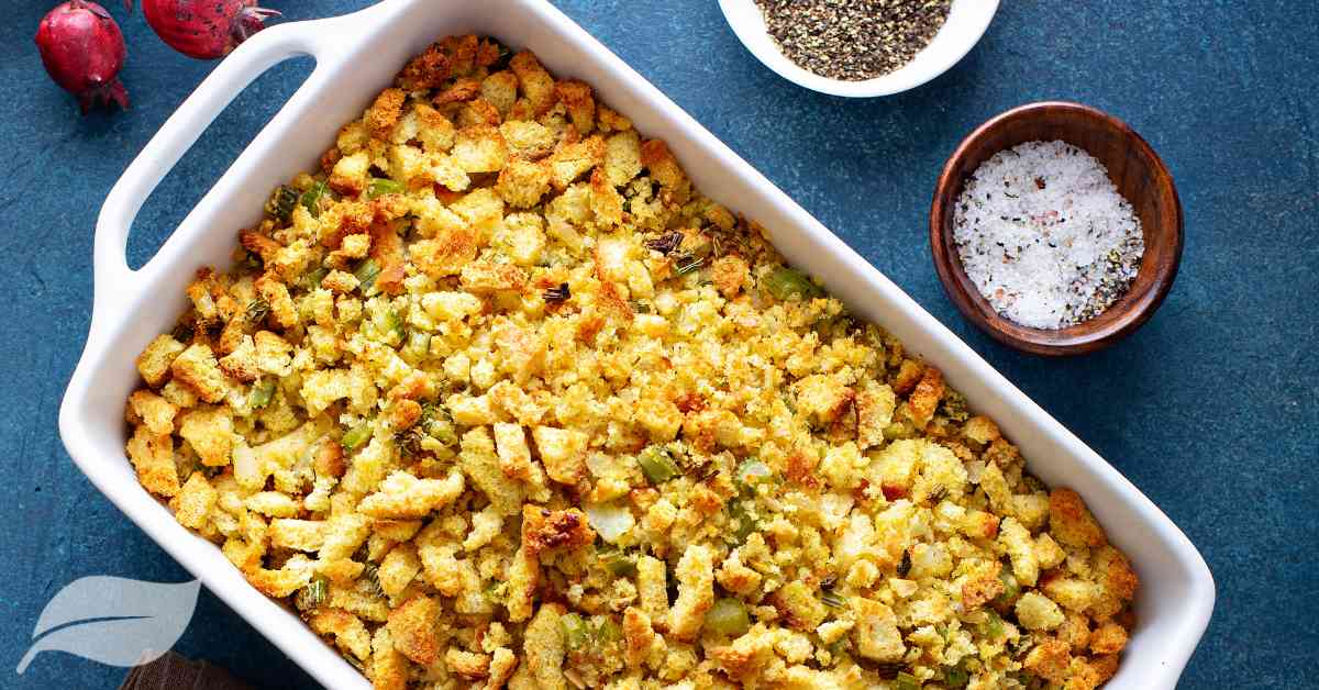 christmas side dish on stuffing in a white casserole dish