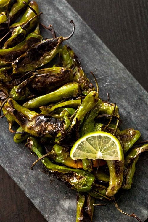 Vegetarian Keto Appetizers Blistered Shishito Peppers with Soy Sauce, Sesame & Lime