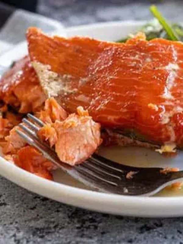 Traeger Smoked Salmon on a white plate that is a perect christmas dinner with seafood recipe