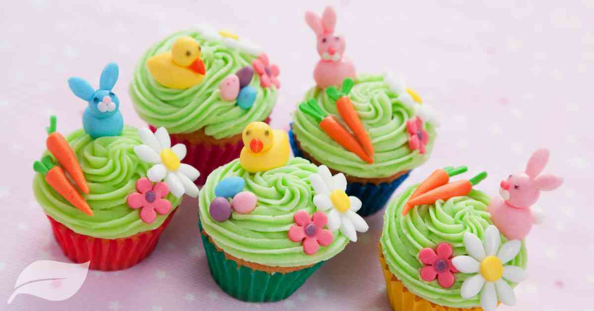 Easter cupcakes with mini carrots, bunnies, and chicks made with frosting